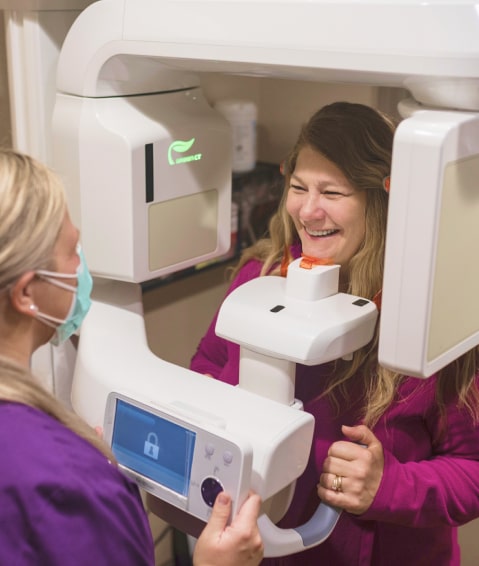 Woman getting TMJ therapy